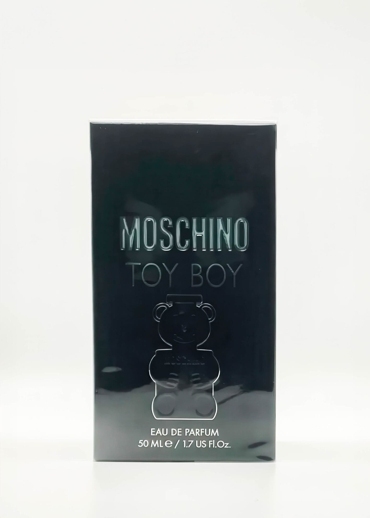 A bottle of moschino toy boy perfume.