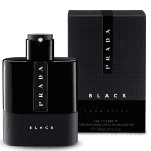 A black bottle of perfume in front of a box.