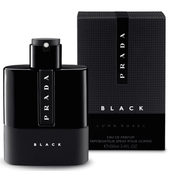 A black bottle of perfume in front of a box.