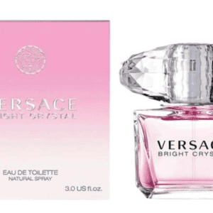 A pink bottle of perfume next to the box.