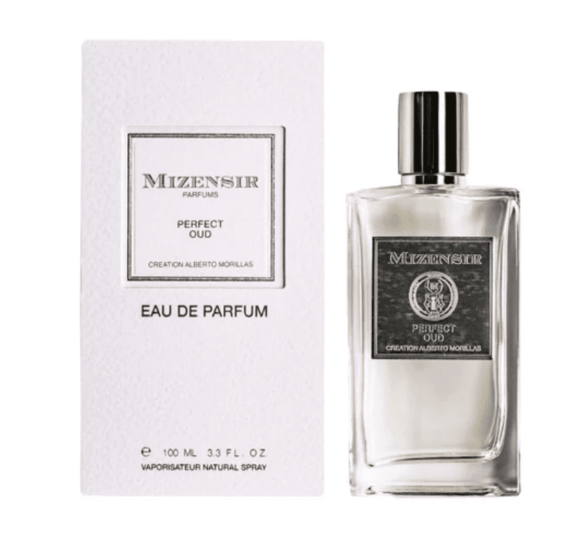 A bottle of perfume with its box on it.
