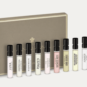 Perfume sample set with various fragrances displayed.