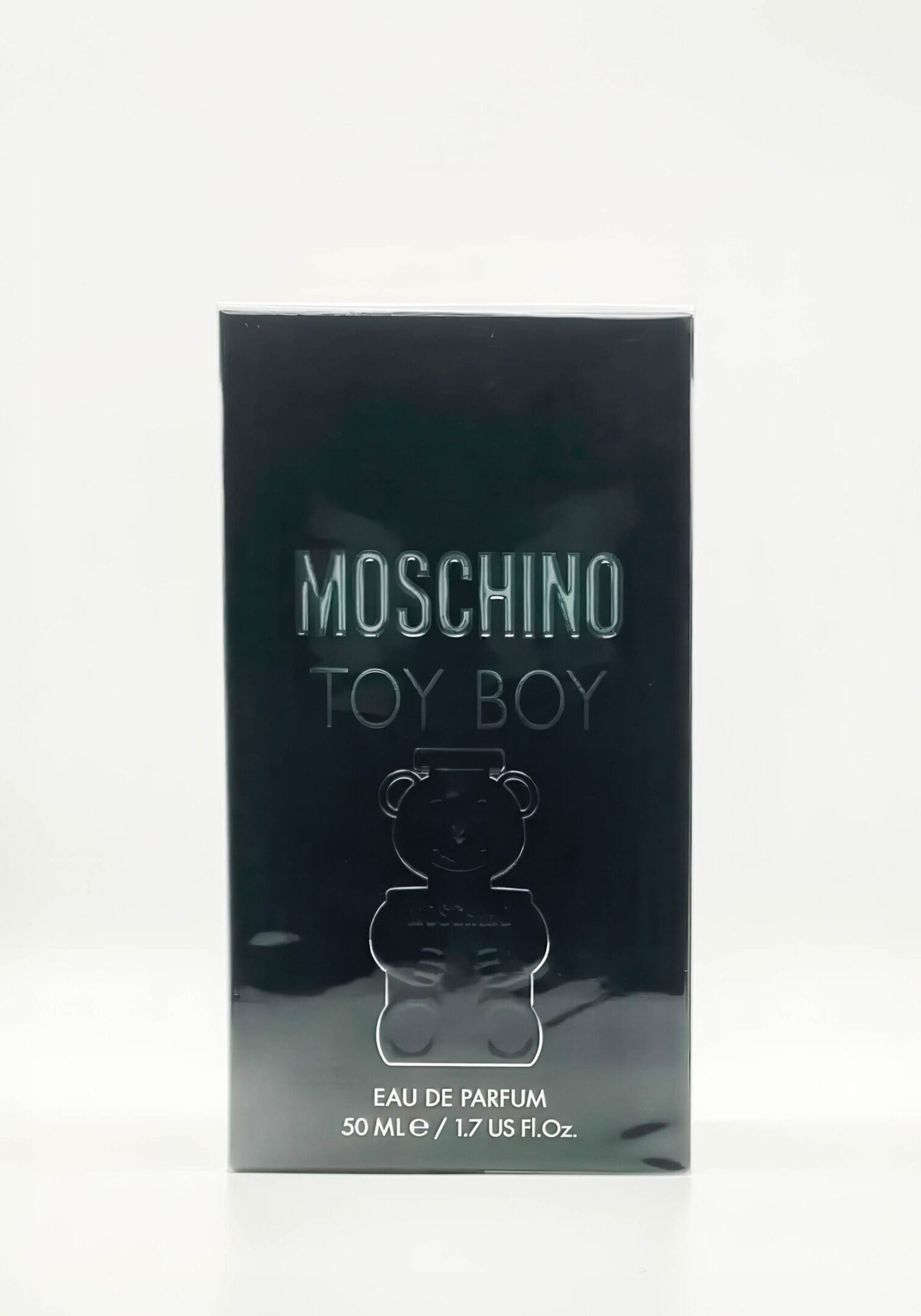 A bottle of moschino toy boy perfume.